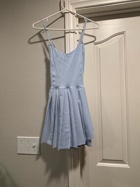 NWOT Light Blue Spaghetti Strap Pleated Skater Dress with attached shorts.